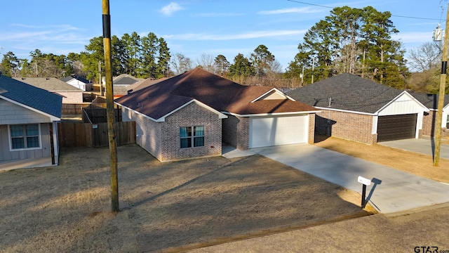 ranch-style home with a garage