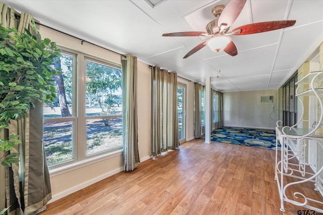 interior space featuring ceiling fan