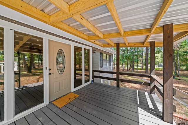 sunroom / solarium with beamed ceiling