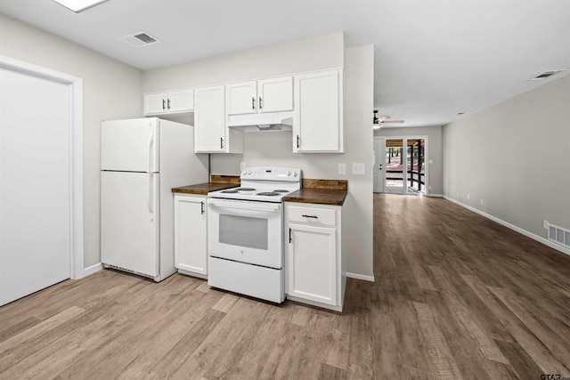 kitchen featuring white cabinets, white appliances, ceiling fan, and light hardwood / wood-style flooring