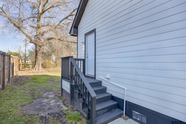 property entrance featuring fence