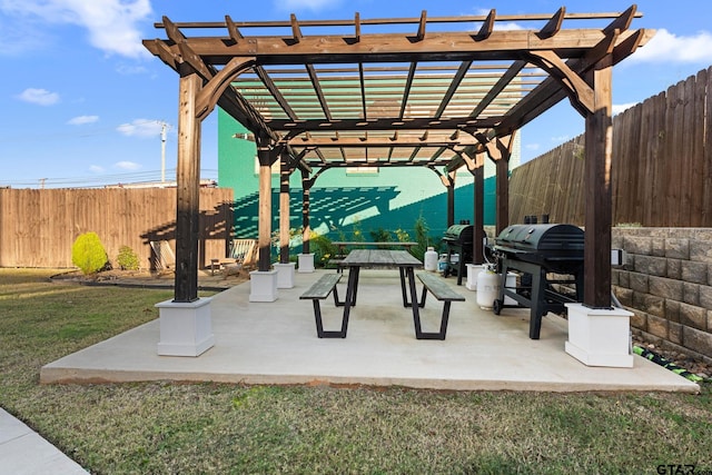 view of community with a pergola, a lawn, and a patio