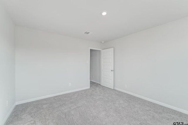 206 Parker Oaks Ct, Chandler, TX 75758 - carpeted spare room featuring baseboards and recessed lighting