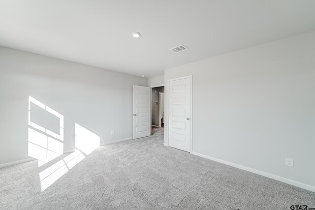 206 Parker Oaks Ct, Chandler, TX 75758 - spare room featuring carpet floors and baseboards