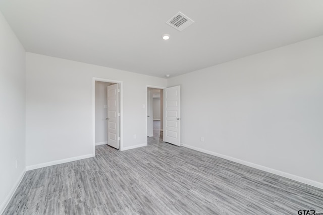 206 Parker Oaks Ct, Chandler, TX 75758 - empty room with wood finished floors, baseboards, and recessed lighting