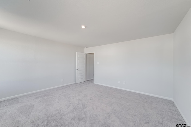 206 Parker Oaks Ct, Chandler, TX 75758 - unfurnished room with baseboards, carpet flooring, and recessed lighting