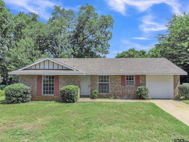 1523 Austin Dr, Tyler, TX 75701 - single story home featuring driveway, a garage, a front yard, and brick siding