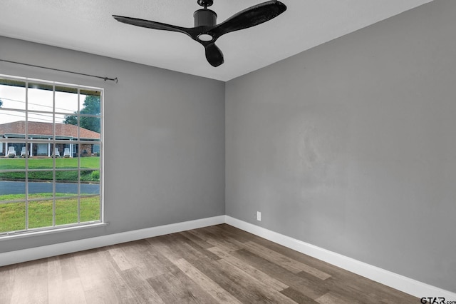 1523 Austin Dr, Tyler, TX 75701 - unfurnished room with wood finished floors and a ceiling fan