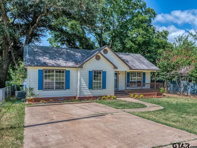 15509 Cedar Bay Dr, Bullard, TX 75757 - ranch-style home featuring covered porch, roof with shingles, a front yard, fence, and cooling unit