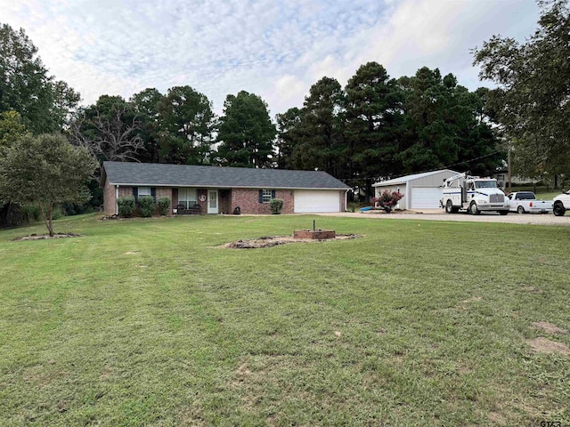 ranch-style home featuring brick siding and a front yard