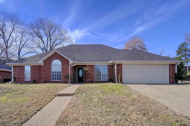 single story home featuring a front yard and a garage