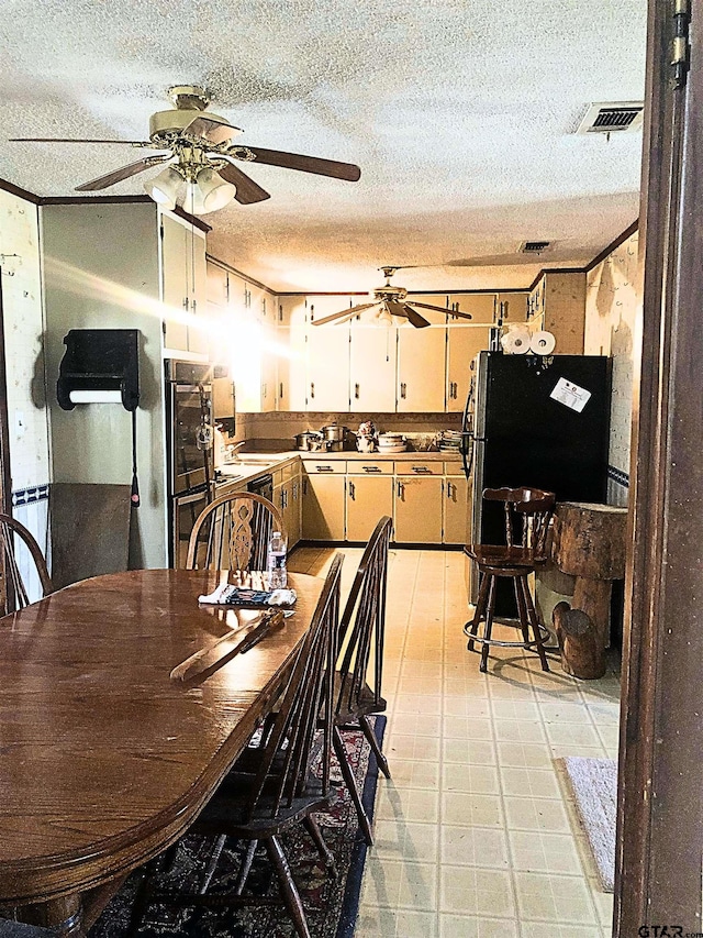 15672 Fm 3204, Brownsboro, TX 75756 - dining area featuring a textured ceiling and ceiling fan