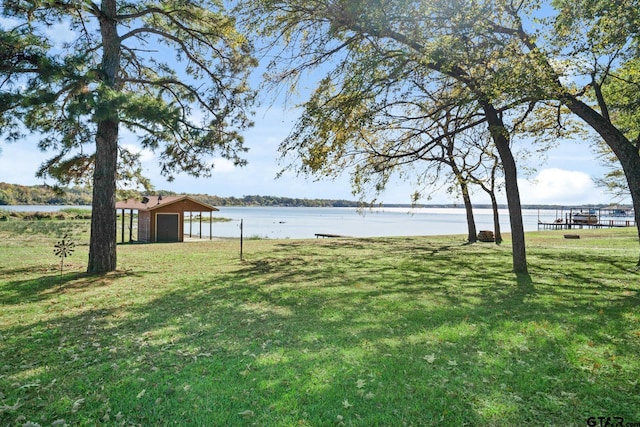 view of yard with a water view