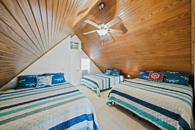 carpeted bedroom featuring vaulted ceiling, ceiling fan, and wood ceiling