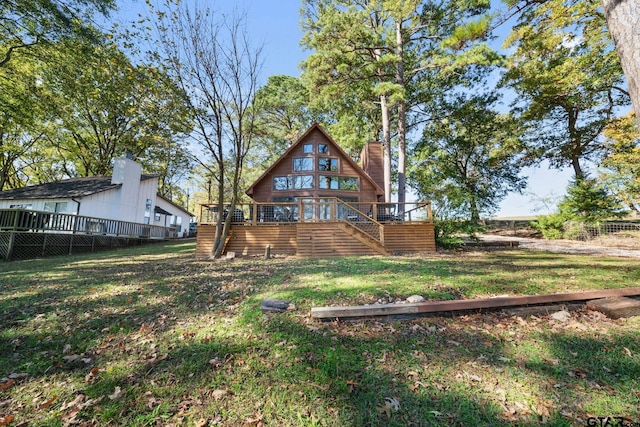 view of yard with a deck