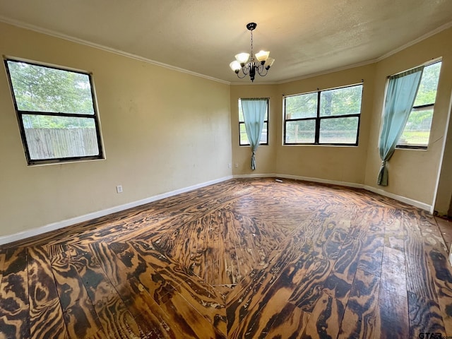 20624 Hewitt Cir, Chandler, TX 75758 - empty room featuring a chandelier, ornamental molding, and baseboards