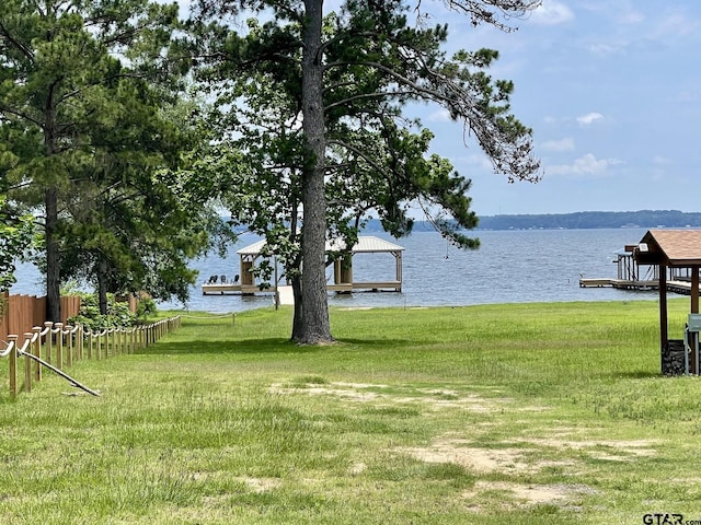 20624 Hewitt Cir, Chandler, TX 75758 - view of yard with a water view and a boat dock