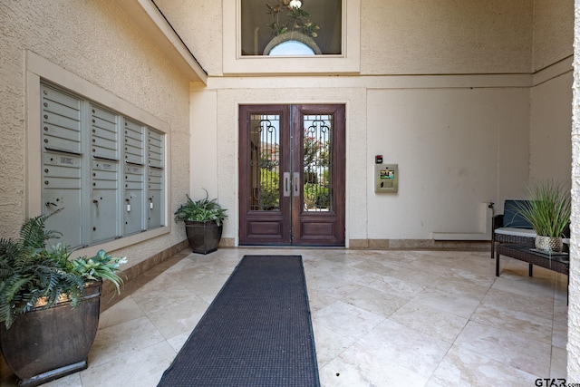 3363 Cascades Blvd, Tyler, TX 75709 - doorway to property featuring french doors and stucco siding
