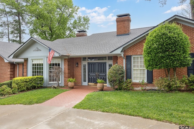 view of front of house with a front yard