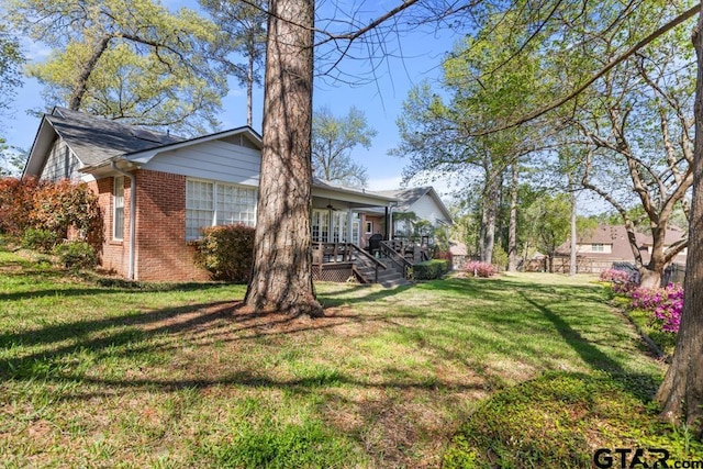 exterior space featuring a lawn