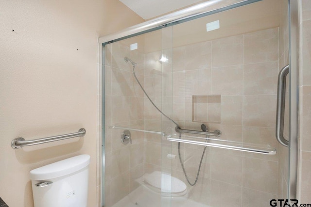 206 E Mims St, Tyler, TX 75702 - full bathroom featuring toilet and a shower stall