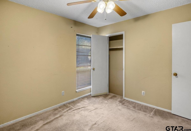 206 E Mims St, Tyler, TX 75702 - unfurnished bedroom featuring carpet, a textured ceiling, and baseboards