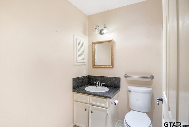 206 E Mims St, Tyler, TX 75702 - half bathroom with toilet and vanity