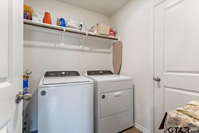 203 Parker Oaks Dr, Chandler, TX 75758 - washroom featuring separate washer and dryer