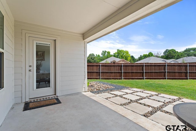 203 Parker Oaks Dr, Chandler, TX 75758 - fenced backyard featuring a patio