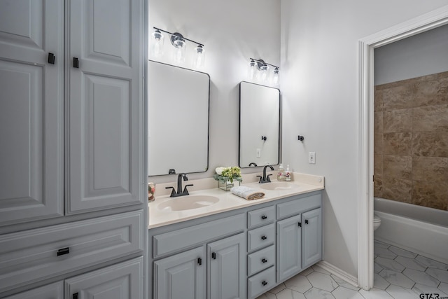 629 Whiteoak Ln, Tyler, TX 75703 - bathroom featuring double vanity, tile patterned floors, and bathing tub / shower combination