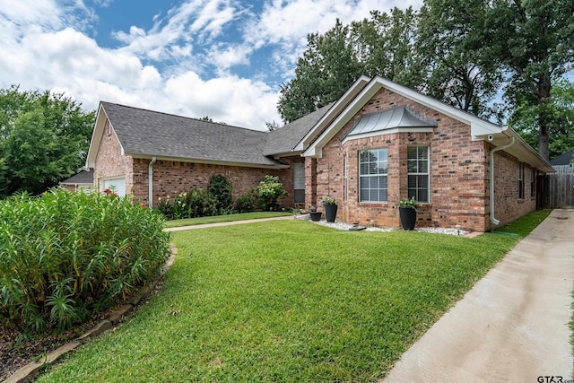 629 Whiteoak Ln, Tyler, TX 75703 - view of front facade with brick siding and a shingled roof