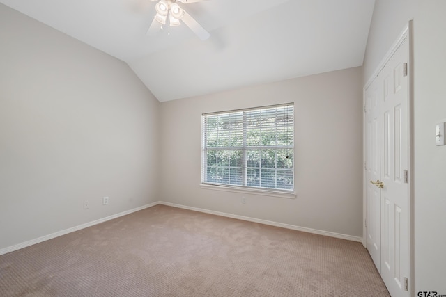 629 Whiteoak Ln, Tyler, TX 75703 - unfurnished room featuring light carpet, vaulted ceiling, and a ceiling fan
