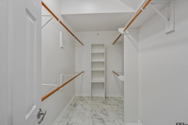 629 Whiteoak Ln, Tyler, TX 75703 - walk in closet featuring light marble finish flooring