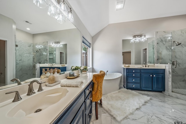 629 Whiteoak Ln, Tyler, TX 75703 - full bathroom featuring a marble finish shower, marble finish flooring, two vanities, a soaking tub, and vaulted ceiling