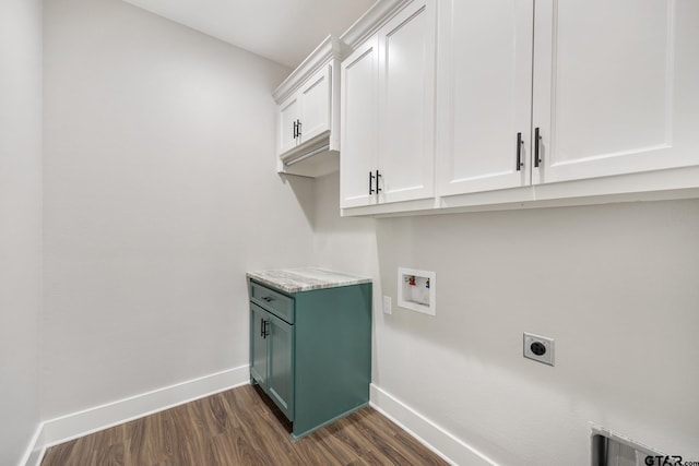 laundry room with electric dryer hookup, cabinets, dark hardwood / wood-style floors, and washer hookup