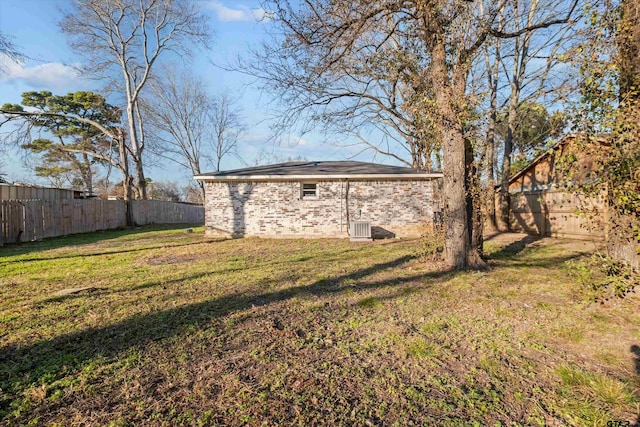 view of yard with central AC