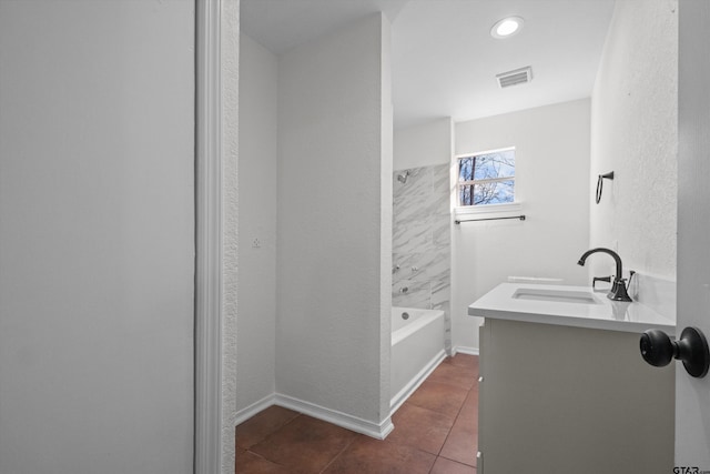 bathroom with vanity and tile patterned flooring