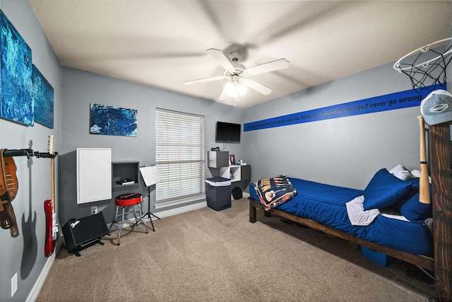 carpeted bedroom with ceiling fan