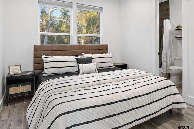 bedroom featuring connected bathroom