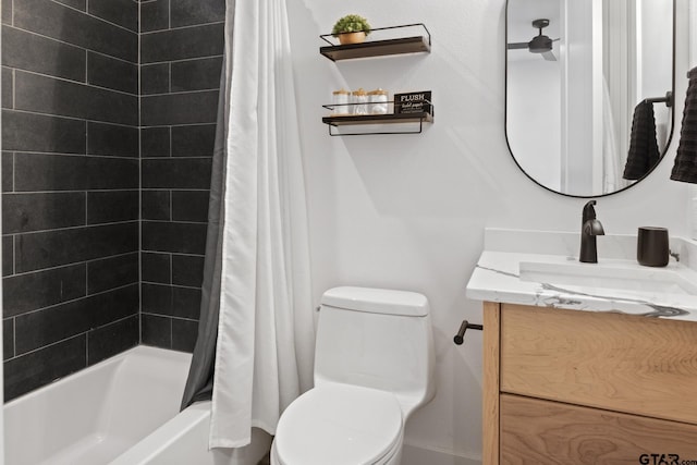 full bathroom featuring vanity, toilet, and shower / tub combo with curtain