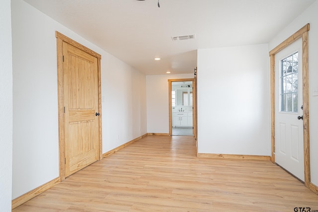 foyer entrance featuring light hardwood / wood-style flooring