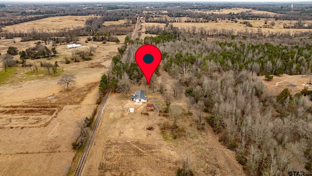 birds eye view of property featuring a rural view