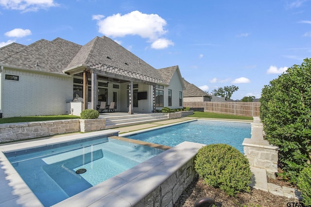 3116 Forest Ridge Cv, Tyler, TX 75703 - view of swimming pool featuring an in-ground hot tub, a patio area, and a fenced backyard