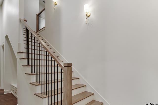 3116 Forest Ridge Cv, Tyler, TX 75703 - stairway featuring wood finished floors