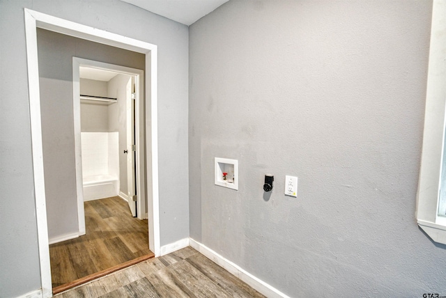 laundry area with washer hookup, wood-type flooring, and hookup for an electric dryer