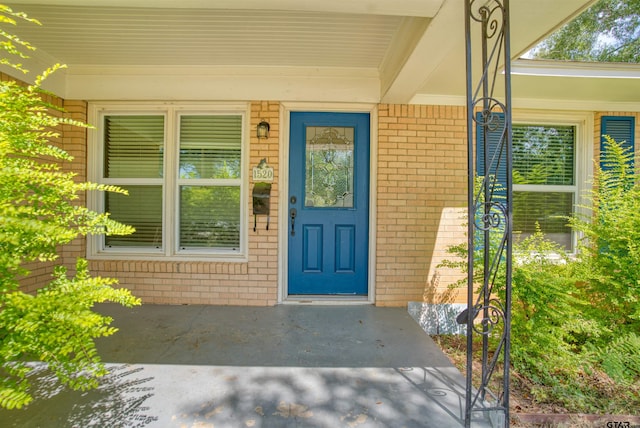 entrance to property with a porch