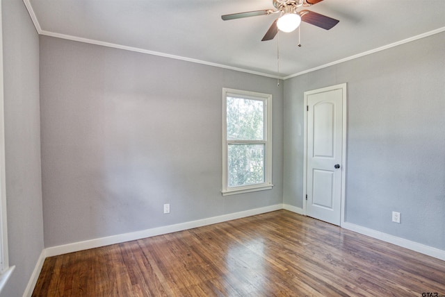 spare room with ornamental molding, wood-type flooring, and ceiling fan