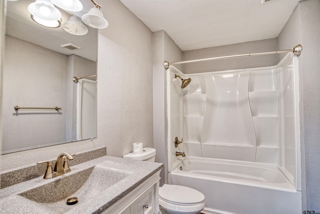 full bathroom featuring toilet, vanity, and shower / bath combination