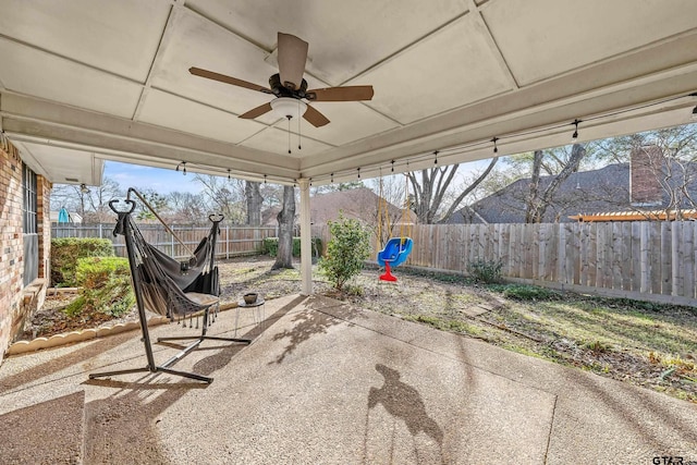 view of patio featuring ceiling fan