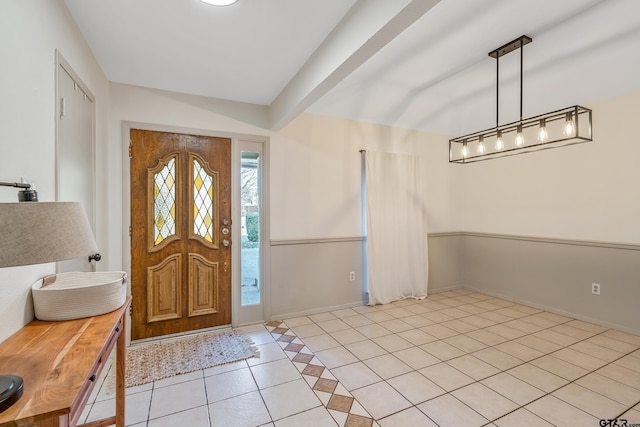 foyer featuring light tile patterned flooring